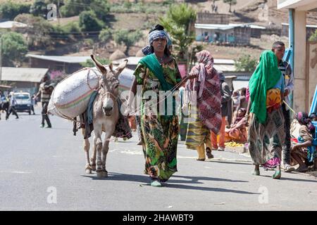 Woman, pack mule, market, Asebe Teferi, Oromia, Ethiopia Stock Photo