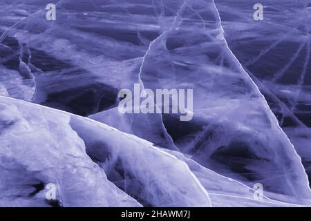 ice texture on Lake Baikal in winter. ice of the color of the year, very peri. concept for winter postcards, travel. Russia Stock Photo