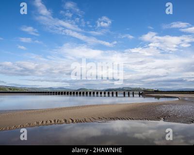 View of the Arnside Viaduct spanning Morecambe Bay, seen from Arnside, a town in Cumbria, England. Stock Photo