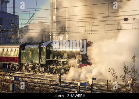 The Royal Scot heritage steam engine hauling the Christmas White Rose railtour from llandudno Junction to York seen leaving Bank Quay station in Warri Stock Photo