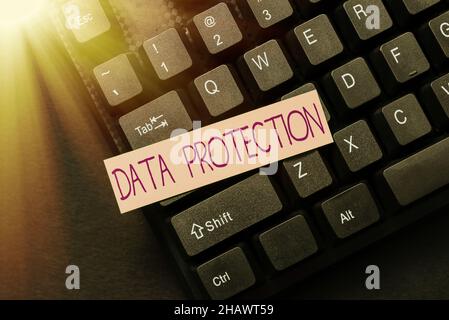 Hand writing sign Data Protection. Word Written on safeguarding information away from a possible data breach Creating Social Media Comment Message Stock Photo