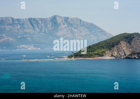 Hawaii beach, seafront view at St. Nicholas Island in Adriatic Sea near town Budva, Montenegro, Europe Stock Photo