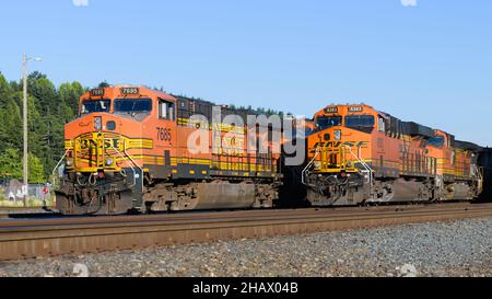 Seattle - July 23, 2018; Several BNSF locomotives in Seattle.  The trains are on multiple tracks under a clear summer blue sky Stock Photo
