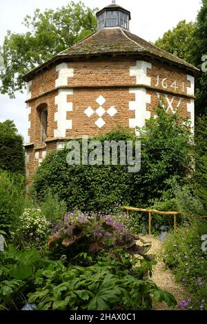 Octagonal dovecote, dated 1641, in the gardens of Hellens Manor, Much Markle, Herts, UK Stock Photo