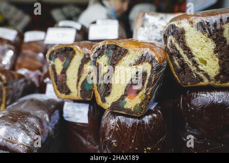 Shallow depth of field (selective focus) image with traditional Romanian winter holidays and easter baked sweet bread dessert named cozonac for sale i Stock Photo
