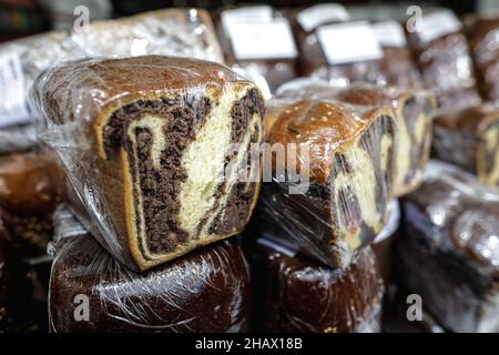Shallow depth of field (selective focus) image with traditional Romanian winter holidays and easter baked sweet bread dessert named cozonac for sale i Stock Photo