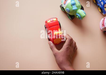 colorful plastic toys on blue background  Stock Photo