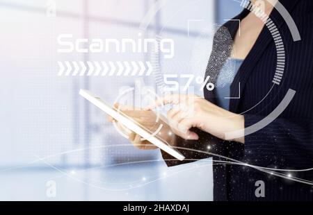 Hand touch white tablet with digital hologram scanner sign on light blurred background. Global world telecommunication network. Business Technology Sa Stock Photo
