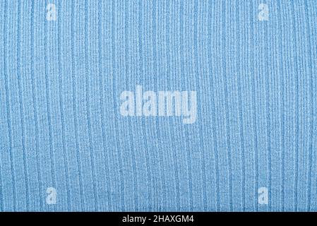 Background from blue woolen fabric of a factory production. Abstract fabric background. Stock Photo