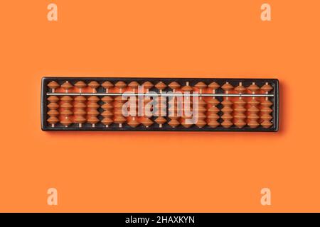 Abacus for mental math. Abacus on colored background. Mental arithmetic and Mathematics concept Stock Photo