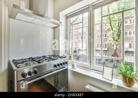 Interior of modern kitchen with stove Stock Photo