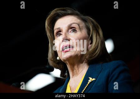 Washington, United States. 15th Dec, 2021. House Speaker Nancy Pelosi (D-CA, wearing the colors of the Golden State Warriors) speaks at her weekly press conference. Credit: SOPA Images Limited/Alamy Live News Stock Photo