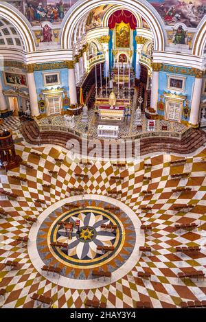 Internal view of the monumental parish church of St Mary dedicated to the Assumption of Our Lady, known as the Mosta Rotunda or Mosta Dome - Malta. Stock Photo