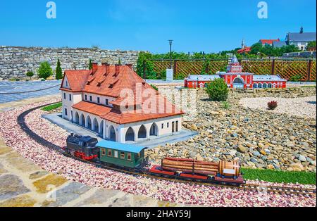 The railway model with train and railway stations of different Ukrainian cities, Museum of miniatures, Kamianets-Podilskyi, Ukraine Stock Photo