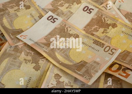 Euro banknotes bills heap,money earnings income,economy business Stock Photo