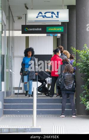 Sydney, Australia. 16 Dec 2021. Welfare recipients outside a Centrelink social security office in Bondi Junction. Credit: Robert Wallace / Wallace Media Network / Alamy Live News