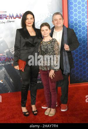 Los Angeles, California, USA 13th December 2021 (L-R) Actress Meredith Salenger, Alice Oswalt and Actor Patton Oswalt attend Sony Pictures Presents The Los Angeles Premiere of Marvel Studios 'Spider-Man No Way Home' at Regency Village Theatre on December 13, 2021 in Los Angeles, California, USA. Photo by Barry King/Alamy Stock Photo Stock Photo