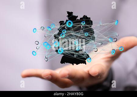 3D rendered German map hovering on a person's hand Stock Photo