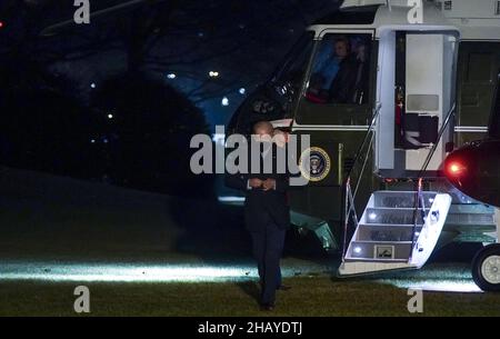 Washington, United States. 15th Dec, 2021. President Joe Biden walks in to the White House after returning from Kentucky where he will visited Fort Campbell, Mayfield, and Dawson Springs, to survey storm damage following extreme weather events at the White House in Washington, DC on Wednesday, December 15, 2021. Today President Biden made additional disaster assistance available to the Commonwealth of Kentucky after a series of storms hit states across the Midwest and the South leaving entire communities destroyed. Photo by Leigh Vogel/UPI . Credit: UPI/Alamy Live News Stock Photo