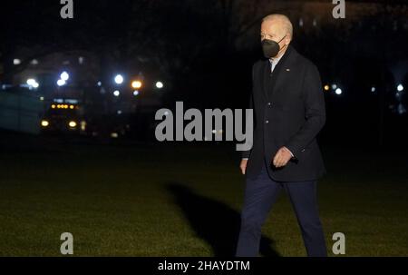 Washington, United States. 15th Dec, 2021. President Joe Biden walks in to the White House after returning from Kentucky where he visited Fort Campbell, Mayfield, and Dawson Springs, to survey storm damage following extreme weather events at the White House in Washington, DC on Wednesday, December 15, 2021. Today President Biden made additional disaster assistance available to the Commonwealth of Kentucky after a series of storms hit states across the Midwest and the South leaving entire communities destroyed. Photo by Leigh Vogel/UPI . Credit: UPI/Alamy Live News Stock Photo