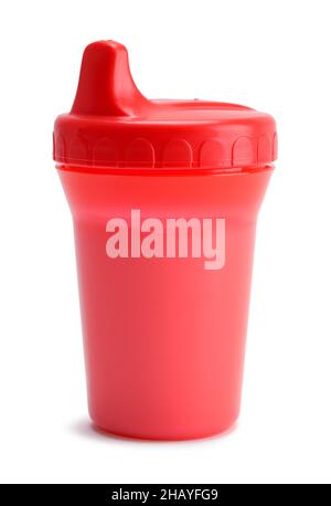 Red Baby Sip Cup Full Of Milk Cut Out on White. Stock Photo