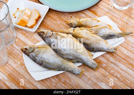Dried roaches served on plate Stock Photo