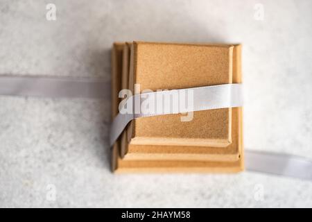 Stack of three gift boxes and a ribbon Stock Photo