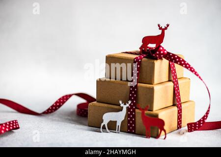 Overhead of Gift Boxes Tied with Red Ribbon on Wood Stock Photo - Image of  earthy, giftboxes: 79802520