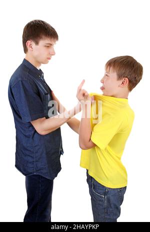 Teenager threaten a Naughty Kid on the White Background Stock Photo