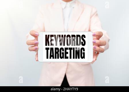 Conceptual caption Keywords Targeting. Internet Concept Use Relevant Words to get High Ranking in Search Engines Presenting New Technology Ideas Stock Photo