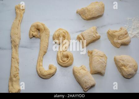 Swedish and scandinavian saffron buns Lussekatter on a table Stock Photo