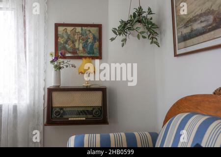Vintage tube radio located on a wooden shelf a house in Sorvagur, Faroer Islands Stock Photo