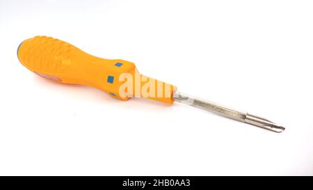 Screwdriver with yellow handle isolated on white background Stock Photo