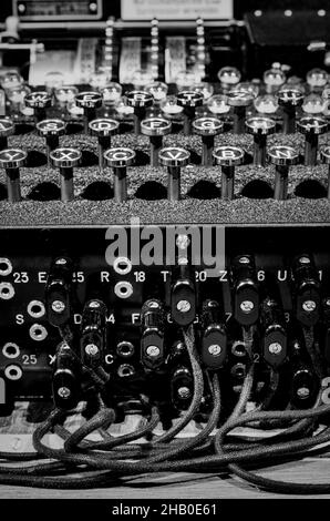 The plugboard, keyboard and rotors from a historic German World War 2 Enigma machine on display at Bletchley Park, Buckinghamshire. Stock Photo