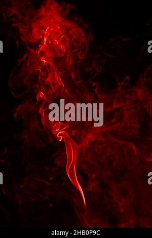 Red abstract light smoke swirl background on black. Stock Photo