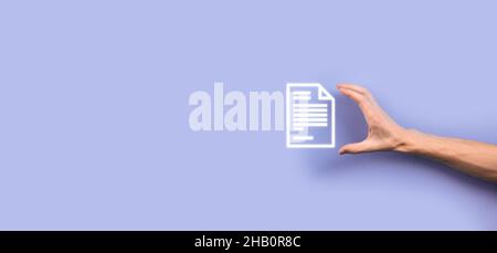 Hand holding a document icon in his hand Document Management Data System Business Internet Technology Concept. Corporate data management system DMS. Stock Photo