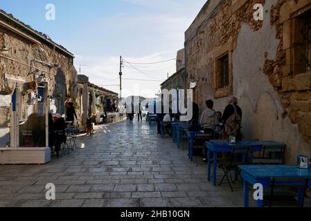 Marzamemi, Italy, 29.03.2018. Alleyway with charming restaurants in province Syracuse, Sicily. Stock Photo
