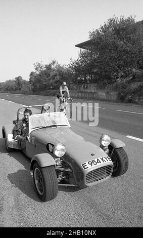 Chris Rea with his Caterham7 race car at the old Reims race track ...