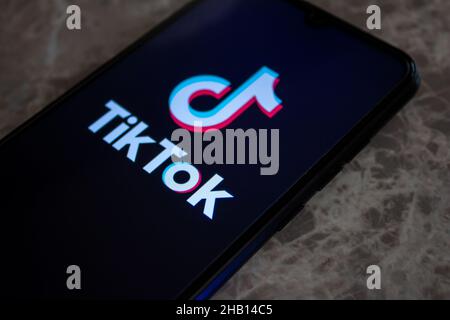 Afyonkarahisar, Turkey - December 13, 2021: TikTok app logo on smartphone screen, popular social media application TikTok icon. Stock Photo