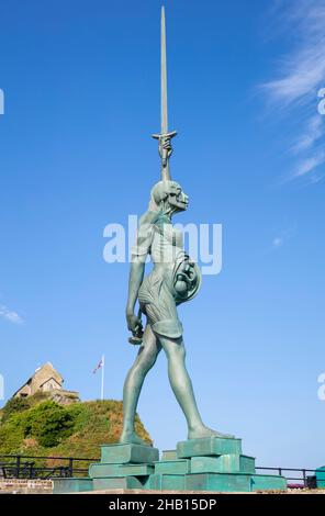 Verity a tall steel and bronze statue of a pregnant Amazonian figure with a sword by Damien Hirst Ilfracombe harbour Ilfracombe Devon England UK GB Stock Photo