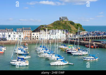 Ilfracombe Harbour - The Chapel of St Nicholas above the fishing boats and yachts in the harbour and town of Ilfracombe Devon England UK GB Europe Stock Photo