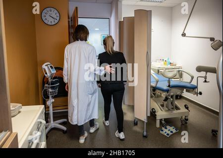 The Family Planning Centre in La Rochelle provides termination of pregnancy. Nurse and young woman coming for an abortion at the hospital Stock Photo