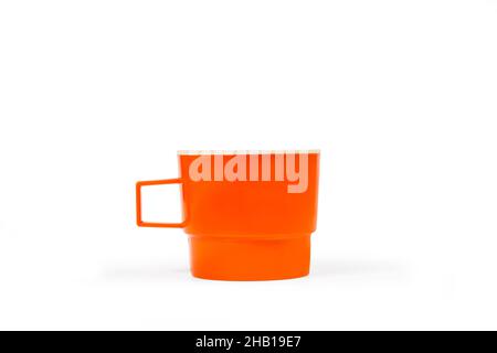 Orange mug isolated on a white background with copy space Stock Photo