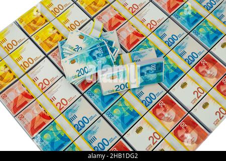 Stack of various Israeli shekel bills. Israel money banknotes of 50, 20, 100 and 200 NIS - New Israeli Shekels background. Top view. Stock Photo