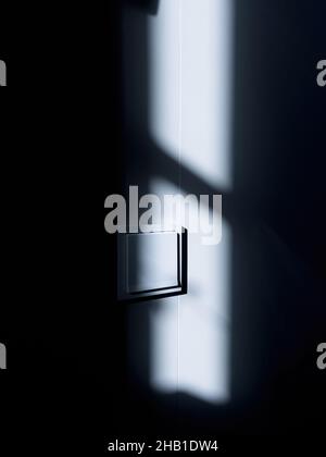 Beautiful wall socket covered with protection plastic lid in modern bathroom Stock Photo