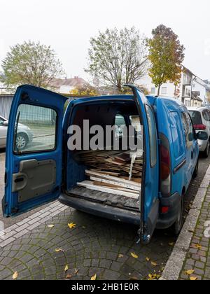 Rear view of open van doors with multiple wooden placards Stock Photo