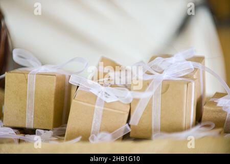 Many gift boxes tied with bows. Gifts concept Stock Photo - Alamy