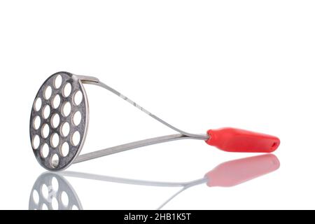 One metal potato masher, macro, isolated on white. Stock Photo