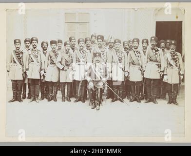 Group Portrait of an Officer with his Regiment in a Courtyard, One of 274 Vintage Photographs, Gelatin silver printing out paper, late 19th-early 20th century, Qajar, Qajar Period, Photo: 5 1/16 x 7 1/16 in., 12.9 x 17.9 cm;, brigade, group, soldiers, uniform Stock Photo