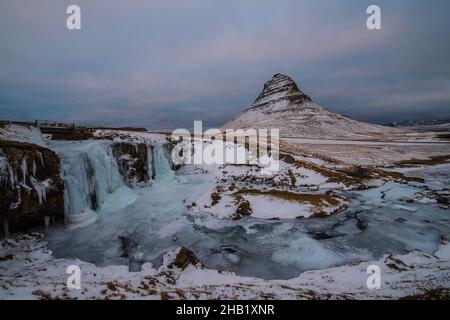 the famous waterfall Kirkjufellsfoss in west Iceland in the winter Stock Photo